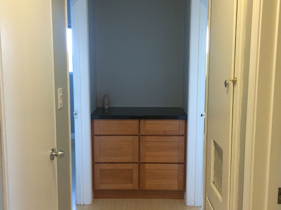 2 Adjacent Bedrooms at End of Hall