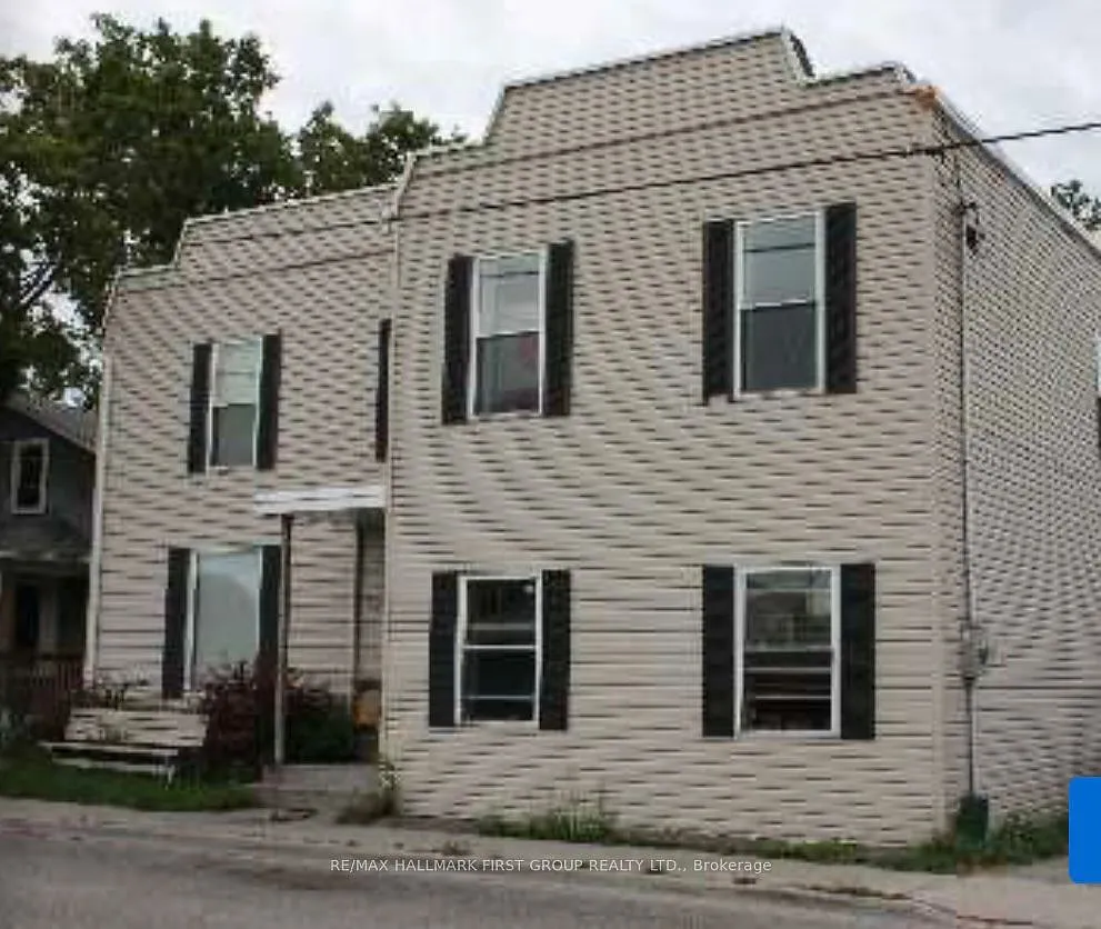 Building Photo - 730 Simcoe St S #3
