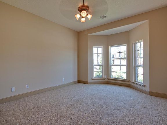  GUEST BEDROOM , CEILING FAN, and HOLLYWOOD BATH **HOME SHOWN NOT ACTUAL HOME***