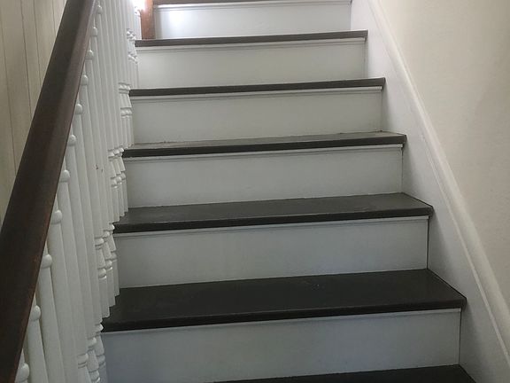 Staircase leading up to apartment.