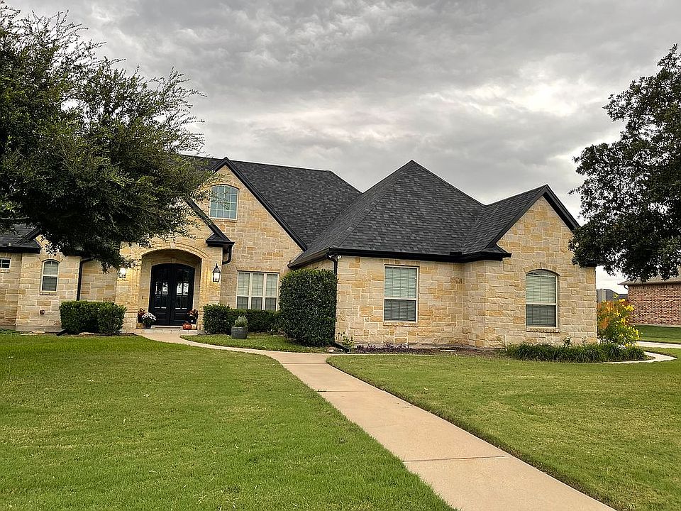 Front new roof & gutters
