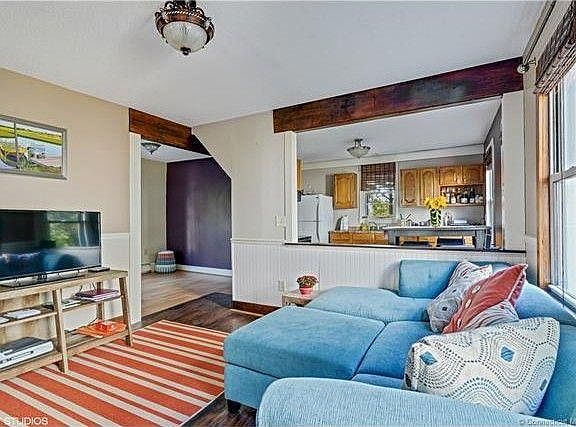 Living room with office space to left.