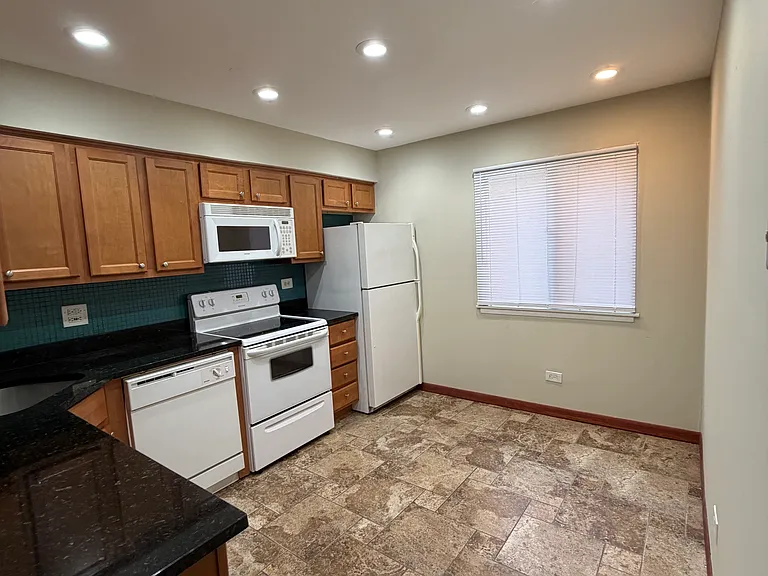 8469 Archer Ave #104 — Photo 3