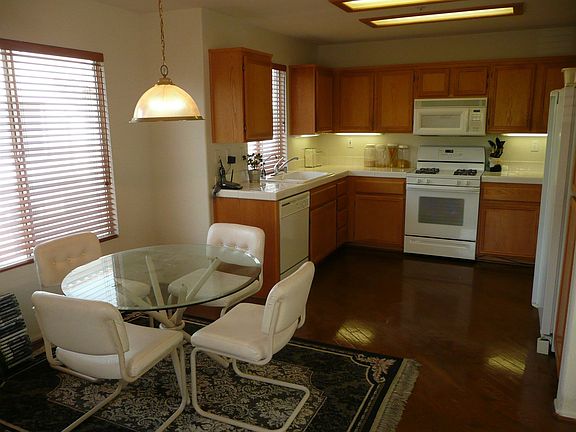 Kitchen nook with beautiful REAL hardwood floors layed at a diagonal