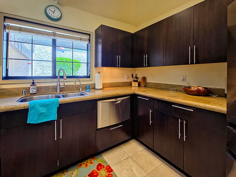 Kitchen includes instant HOT water tap and 2 dishwaters adjacent to each side of the sink.