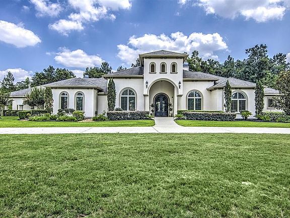 Showstopper Curb Appeal with 4 over sized garages, Designer Pool/Spa and Outdoor Kitchen, Master, Junior Suite, 2 Secondary Beds w/en-suite baths, Study, Formals, Great Room & large Flex Space Up