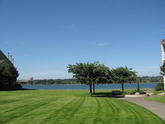 View from deck overlooking courtyard and Columbia River.