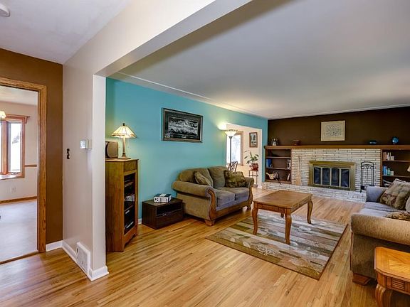 Living Room view from foyer--refinished hardwood floor throughout