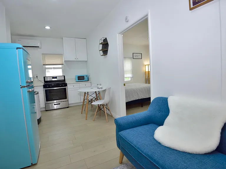 fully furnished, loveseat, refrigerator, microwave, dining table, etc.