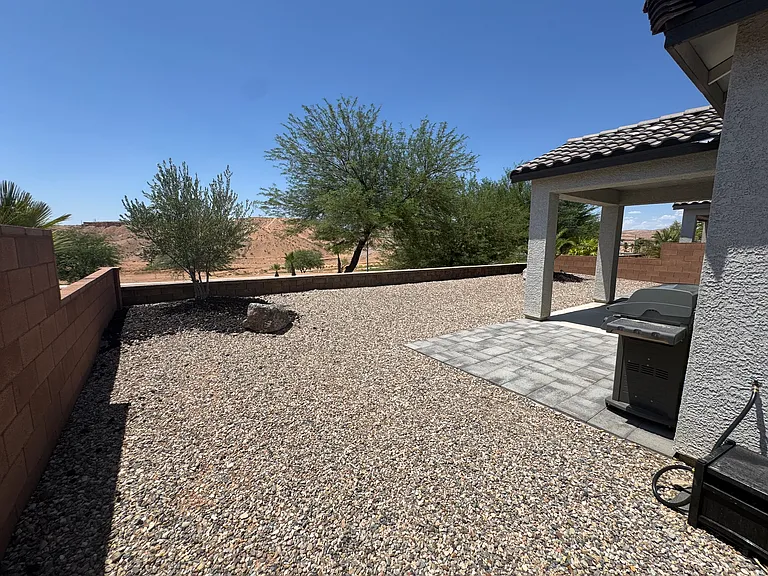 side yard leading to backyard