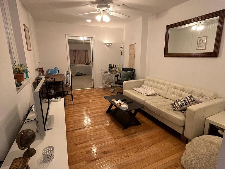 Living room to rear of unit + 2nd bedroom