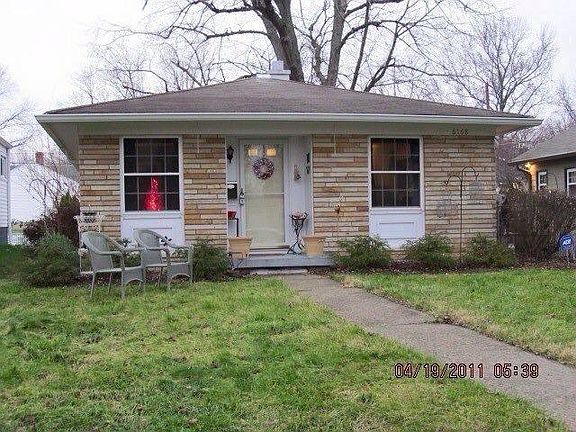 Indiana limestone bungalow, built in 1962. Located across from broad ripple park walking distance to Broad Ripple village.