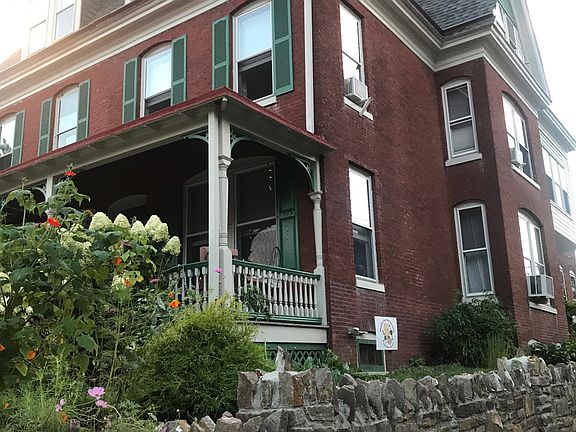 The original 1899 stone wall was taken down and rebuilt ston