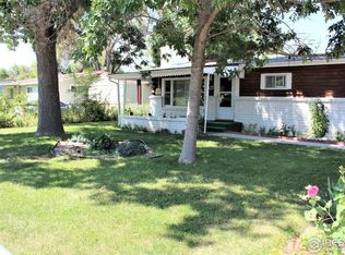 107 Pine St, Log Lane Village, CO 80705