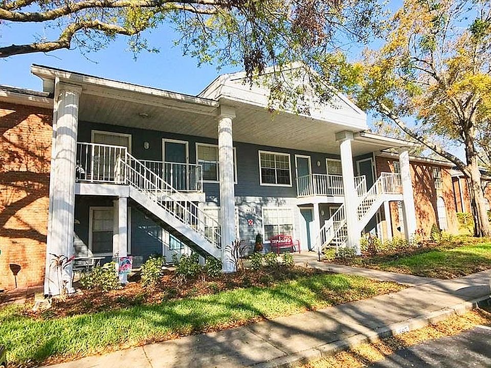Front of condo, designated parking spot is right in front of the building with lots of "guest" parking spots available.