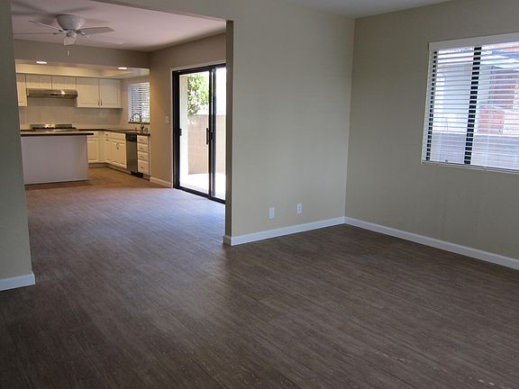 Living room, dining, and kitchen