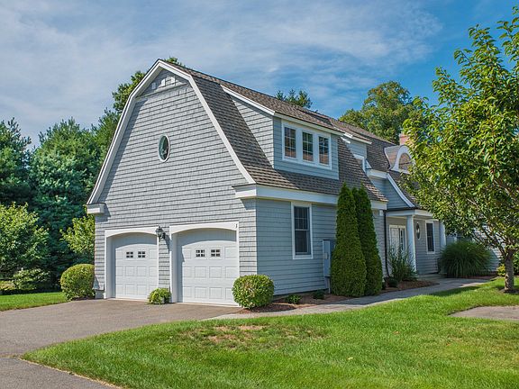 Nantucket style condo with 2-car garage