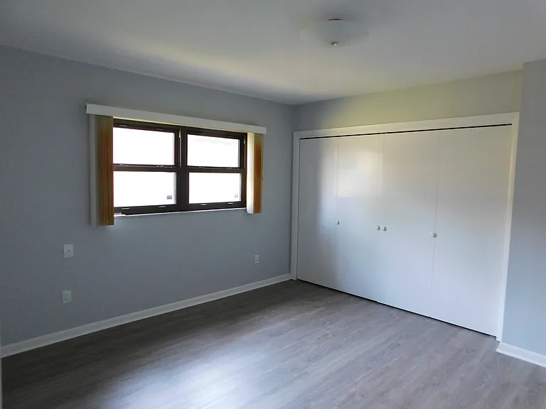 The middle bedroom is approximately 13' by 13'