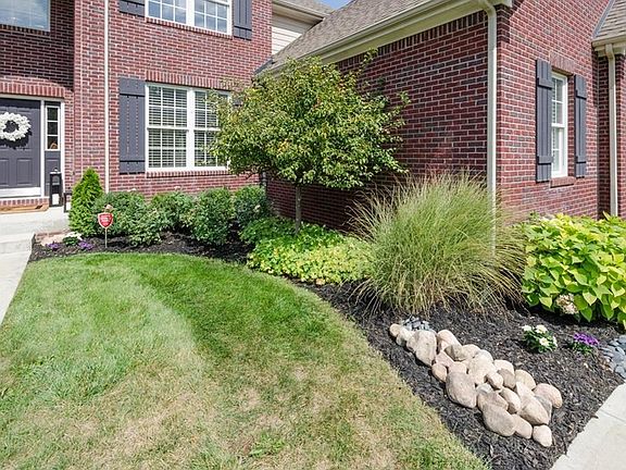 Well maintained home with mature landscaping.