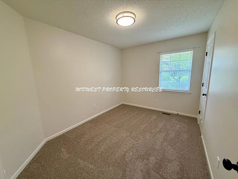 1708 NE Stonewood Dr — Photo 13
