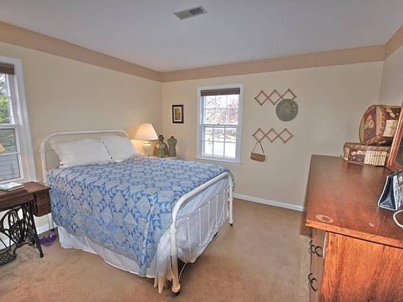 One of three bedrooms