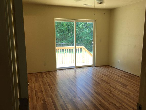 Master bedroom with deck off patio doors