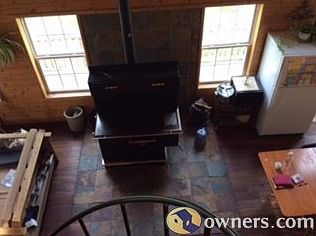 View from upper loft to wood stove