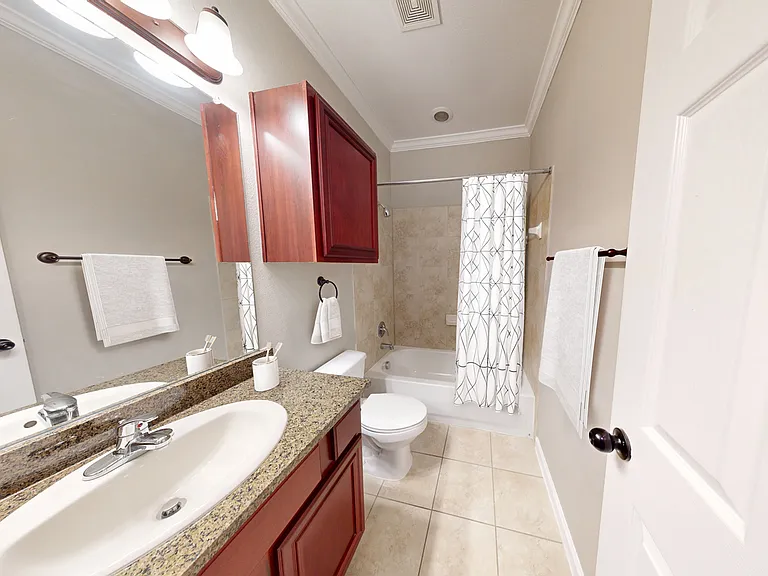 Bathroom with Large Vanity and Tub