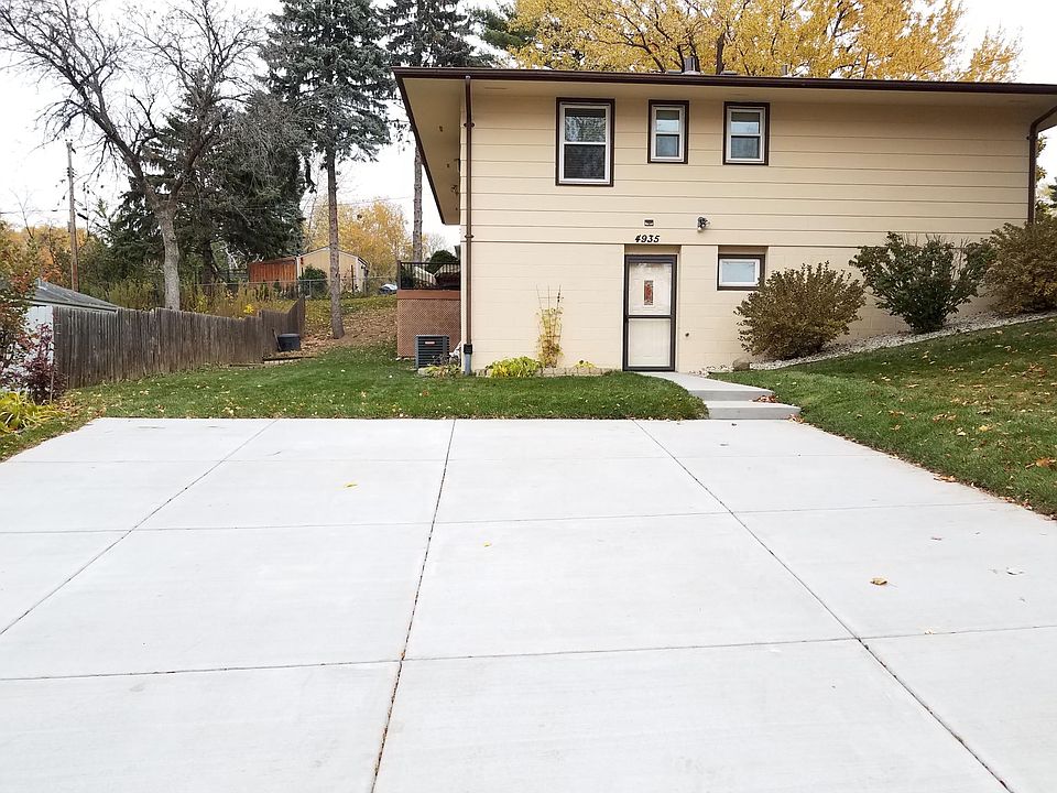 Private off-street driveway, offering convenient parking for up to two cars. Enjoy the ease of having your own dedicated space right at your doorstep.