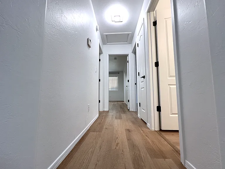 Hallway to two guest bedrooms.