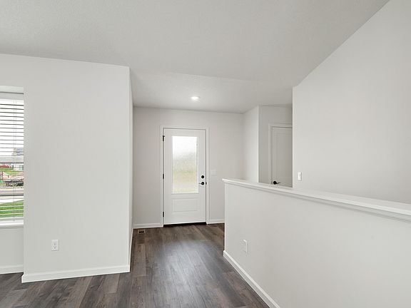 Welcome home Beautiful entry door and inviting foyer.