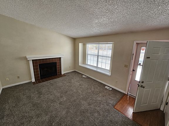 This is a great open feeling home with lots of light. When entering the home, you will find a naturally lit house with a vaulted ceiling and a cozy window seat in the living room.