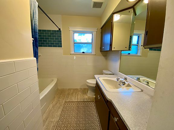 Bathroom with tub and shower