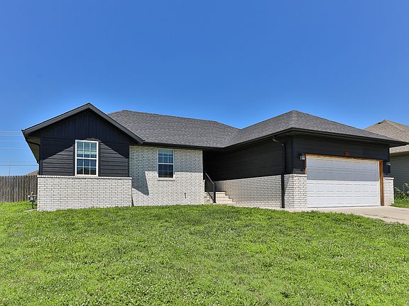 Nice front yard; 2 car garage