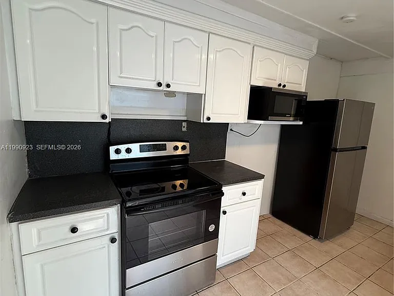 1230 NW 180th Ter #1 — Photo 4
