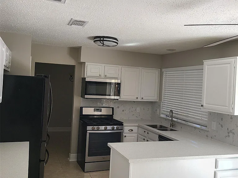 8130 Sunny Ridge Dr — Photo 10