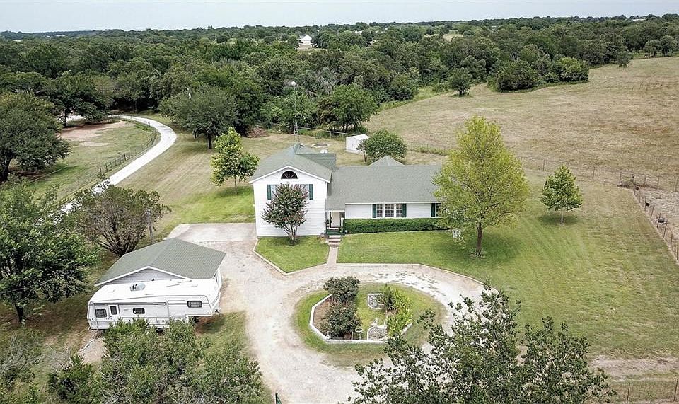 Drone view over the house and circle driveway