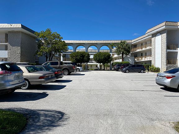 Entrance to Parking Lot with assigned parking spot.