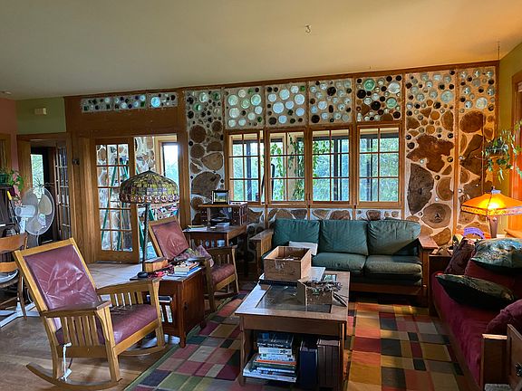 Living room and greenhouse door and windows