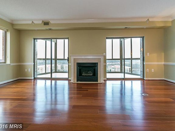 Living Room with large enclosed balcony