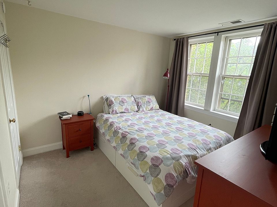 Newly carpeted bedroom.
Big windows on a quiet street.
