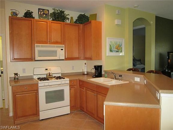 42" cabinets corian counter-tops