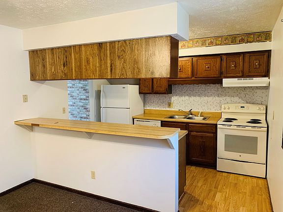 Kitchen. The counter accommodates bar seating on the back side.