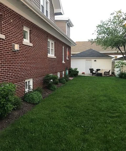 Shared yard with upper unit