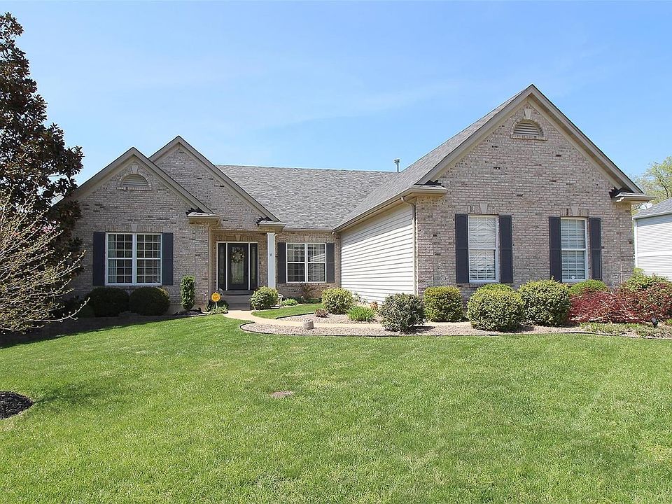 Brick and Vinyl exterior on almost half acre lot