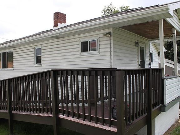 View of the side of the house with a ramp for easy access to enter the house from the rear