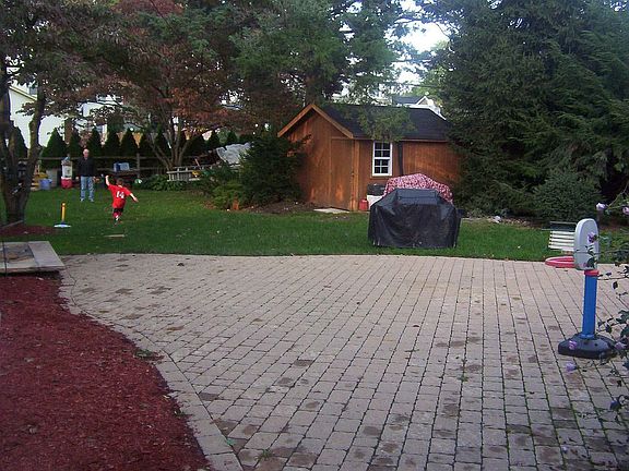 large patio and backyard