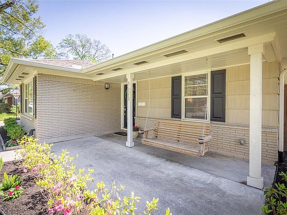 Enjoy a cup of coffee or a glass of wine on this lovely little porch swing.