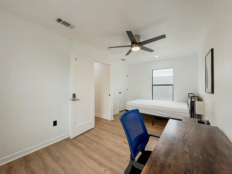 Bedroom 3 - Large room with workspace and closet