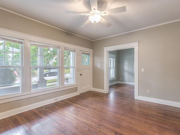 Bonus room with glass doors off living room